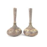 Pair of Middle Eastern white metal vases,