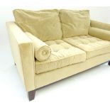 Contemporary suede sofa double seat with roll bolsters, tapering black legs, 156 cm w