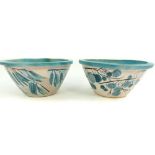 Two glazed stone ware pots with ground leaf exterior and blue glazed interior, 51 cm dia,
