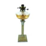 Victorian brass oil lamp with column base and glass reservoir