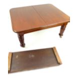 A Victorian mahogany extending dining table, two extra leaves,