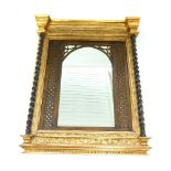 A Victorian design gilt framed mirror, the central plate surrounded by pierced lattice and fretwork,