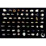 Collection of sixty three rings, including silver, white and yellow metal,