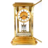 French late 19th C brass and four glass mantel clock, white metal chapter ring with Roman numerals,