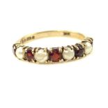 9ct yellow gold, split seed pearl and garnet half eternity / band ring