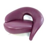 Plum leather designer armchair,