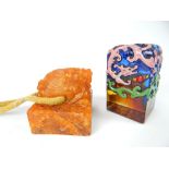 A Chinese rectangular glass polychrome decorated seal, blue and amber,