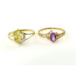 Marquise cut peridot and diamond cluster ring set within a 9ct yellow gold band and a yellow gold