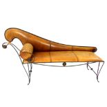 Early 20th chaise longue, iron scroll frame with circle and ball decoration,