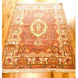 Silk tabriz rug, pink ground, floral medallion to