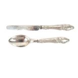 A mid Victorian silver handled spoon and knife