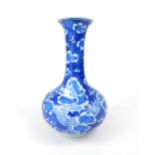 Chinese stem vase, blue and white glaze, dragon decoration amidst clouds, two blue rings to base,