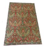 A Kashmiri, hand embroidered chain stitch rug, traditional palmettes in bottle & sage green with