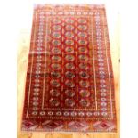 A Bokhara rug with geometrically arranged Turkoman guls, 160x95cm.
