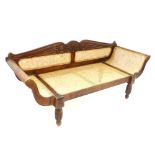 Indian , Colonial hardwood & rattan day bed / chaise lounge / sofa, leaf carving to shaped back,