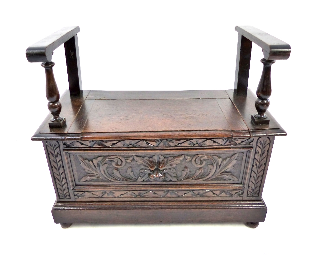 Jacobean style window box seat, oak, twin handles on turned supports, solid seat with storage