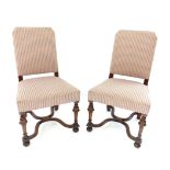 Pair of 19th century walnut upholstered hall chairs, cross frame stretchers, turned legs.