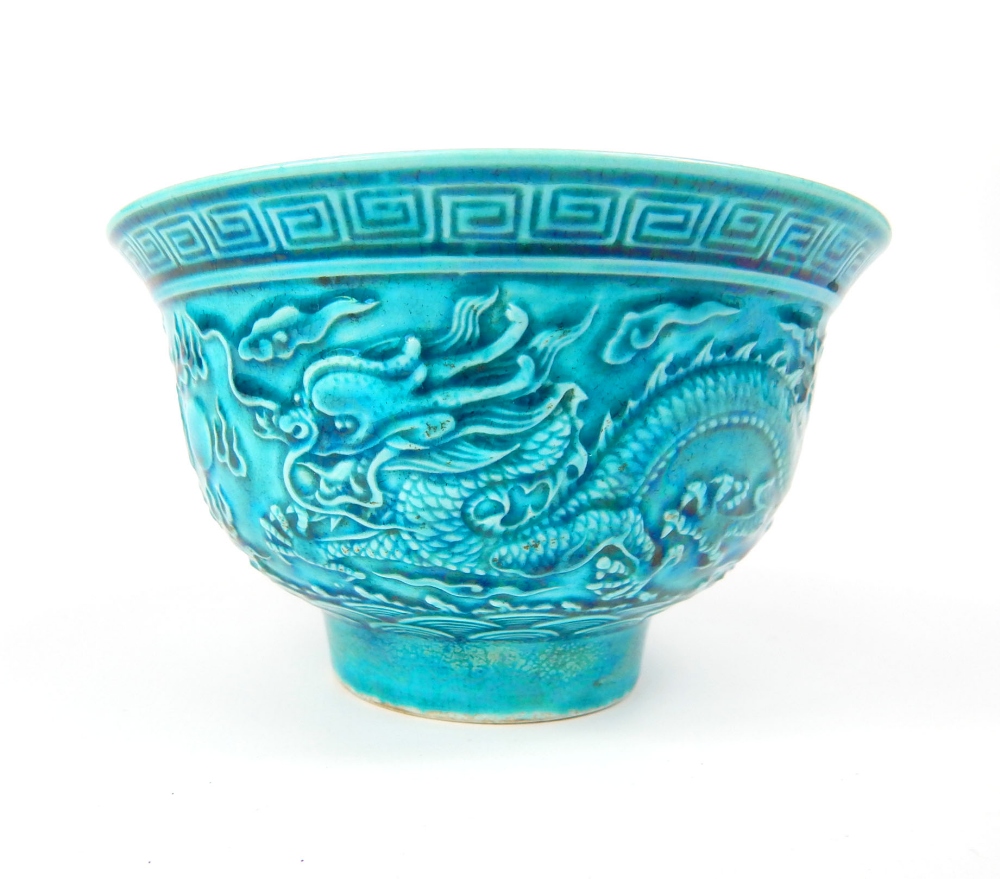 Chinese rice bowl, turquoise glaze, relief decoration of dragons and flaming pearl over the seas, - Image 2 of 4