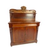 A Victorian mahogany chiffonier, the shaped shielded back centred with a cartouche, above a