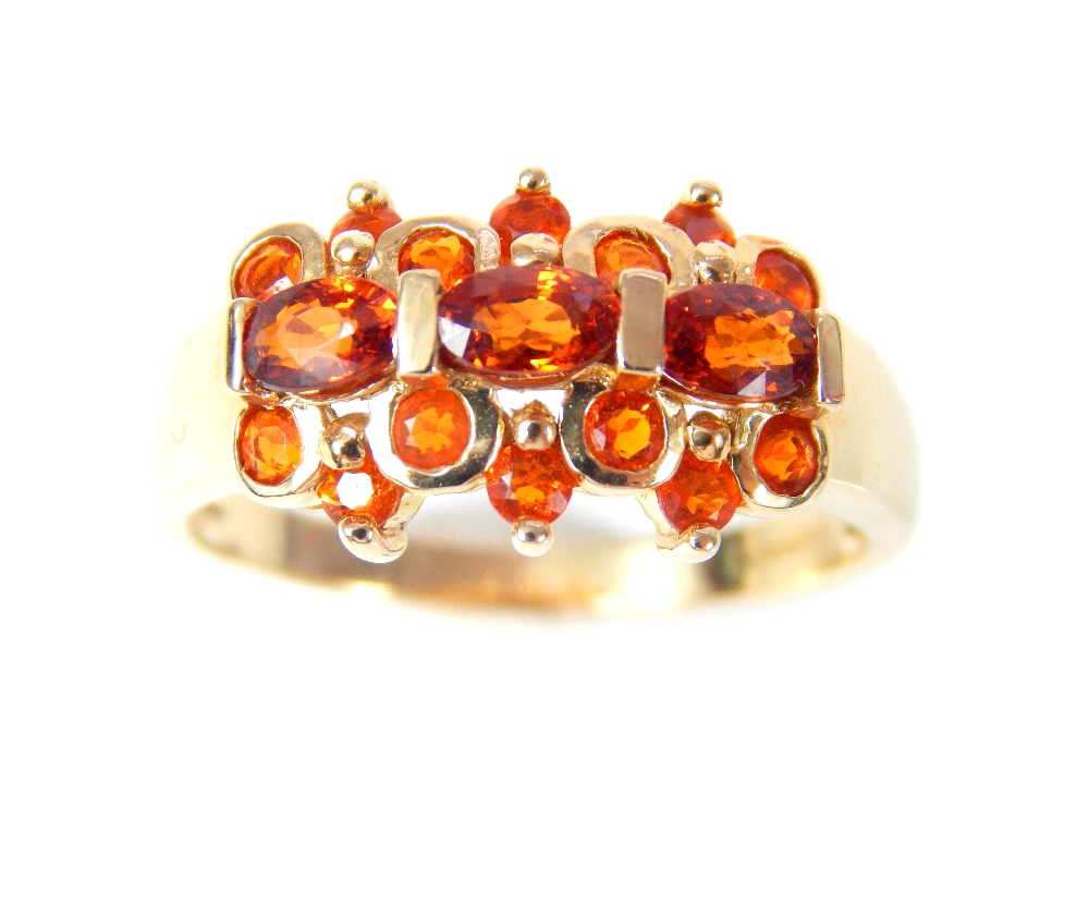 A 9ct yellow gold fire opal set dress ring, overall weight 4.3g