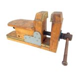 A vintage Tiranti G+ oak and brass winding stone carving vice, 46cm long when closed