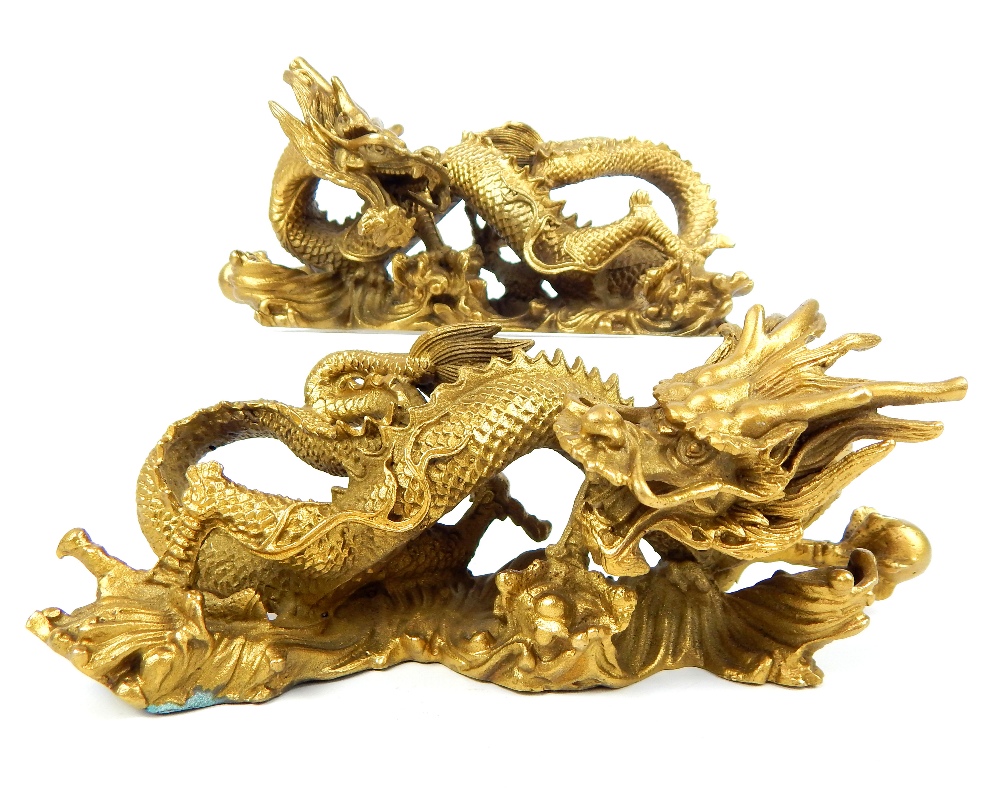 Pair of solid bronze Chinese dragons, open mouthed holding a captured golden pearl, gilded, 9x 21.