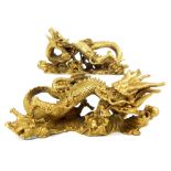 Pair of solid bronze Chinese dragons, open mouthed holding a captured golden pearl, gilded, 9x 21.