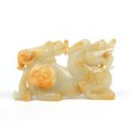 Chinese white jade dragon, with a temple lion upon his back, 5.8x 10cm