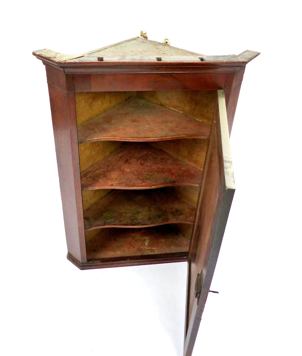 A George III flame mahogany hanging corner cupboard, with single panel door, 95cm high - Image 2 of 2