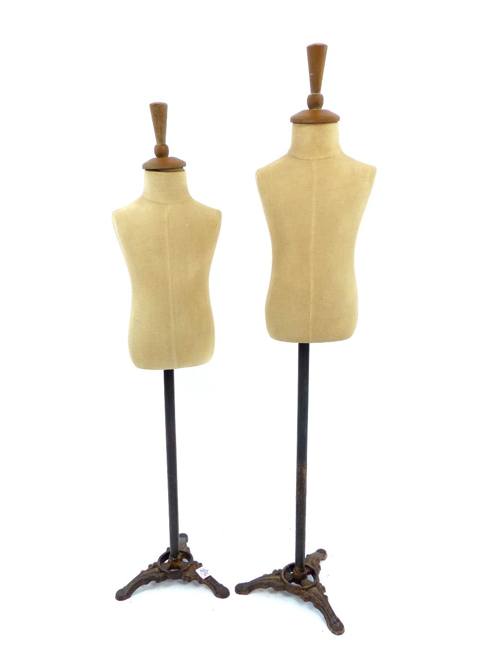 Pair of dressmaker's style mannequin torsos, calico covering, metal stand & legs, 107cm