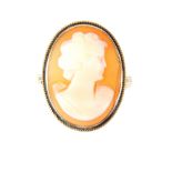 A 9ct yellow gold carved cameo ring, set with portrait of a classical female portrait.