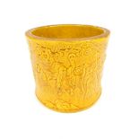 Chinese brush pot, ochre glaze, a gathering of monks with Buddha, applied character stamp to base,