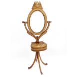 A late 19th century Anglo - Indian hardwood oval floor standing mirror, ivory inlaid geometric,