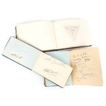 Three early to mid 20th century leather bound autoograph albums, mainly of rugby players.