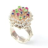 Contemporary silver nest cluster ring, set with sapphires, rubies and diopsides set on a silver