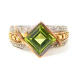 A 9ct yellow gold diamond, peridot and citrine dress ring, on yellow gold band, overall weight 4.1g