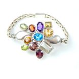 Contemporary silver bracelet, set with citrine, amethyst, garnet, peridot and blue topaz, on a