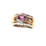 A 9ct bi - coloured gold ruby solitaire ring, overall weight 6.1g