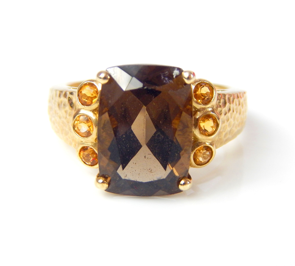 A 9ct yellow gold Topaz and Citrine Ring