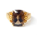 A 9ct yellow gold Topaz and Citrine Ring