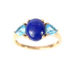 A 9ct gold London blue topaz and Lapis Lazuli ring, on a plain gold band