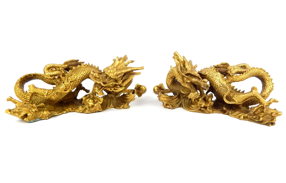 Pair of solid bronze Chinese dragons, open mouthed holding a captured golden pearl, gilded, 9x 21. - Image 2 of 4