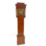 An 18th century inlaid oak and mahogany longcase c