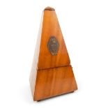A early 20th century French walnut metronome, of p