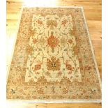 A large handwoven silk handwoven rug, of Persian d