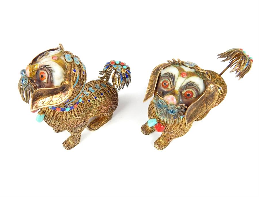 A 19th / early 20th century pair of silver gilt and enamelled Sino - Tibetan models of temple lions, - Image 2 of 5