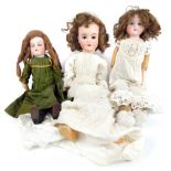 Three dolls