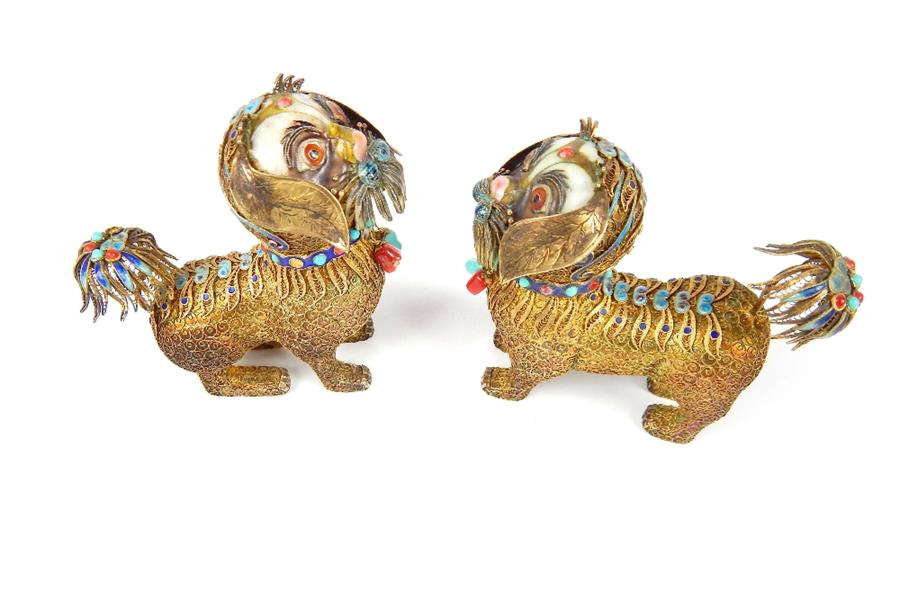 A 19th / early 20th century pair of silver gilt and enamelled Sino - Tibetan models of temple lions, - Image 3 of 5