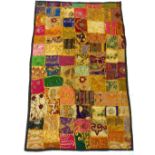 An Indian patchwork wall hanging made from fragmen