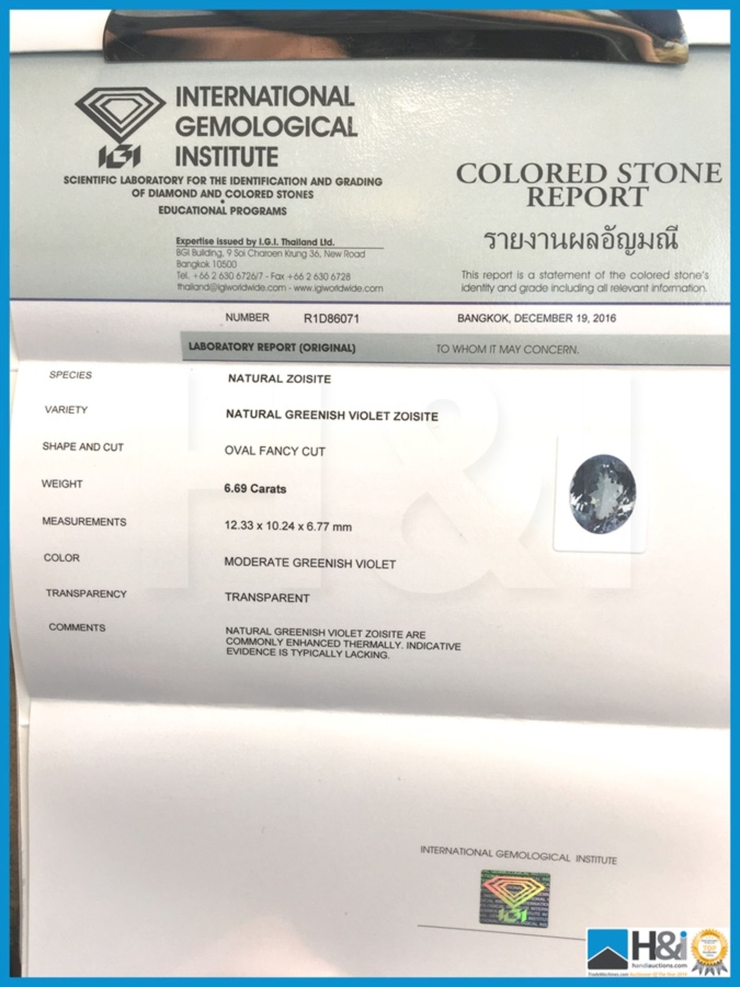 6.69ct Natural Zoisite, Oval Fancy Cut in Moderate Greenish Violet, Transparent with IGI - Image 4 of 5